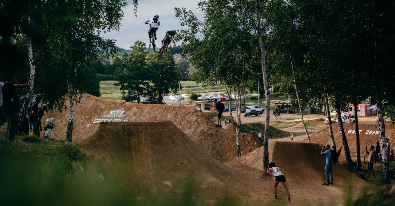 Two guys riding big jump at the Flat Out Days festival